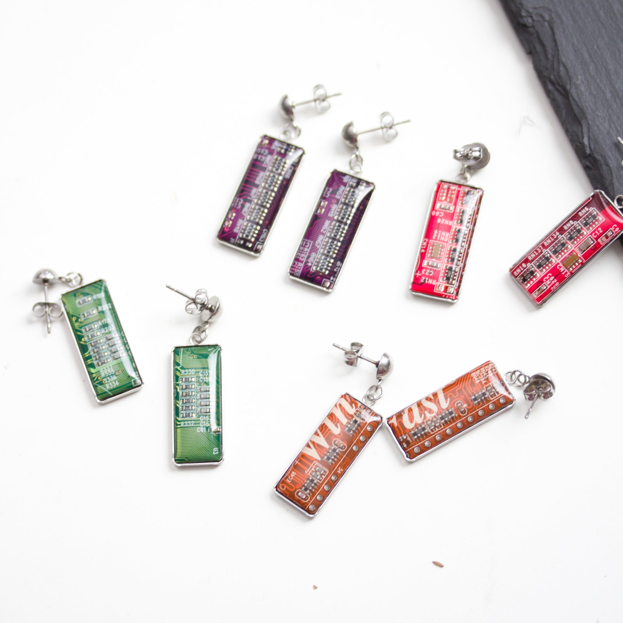 Stud / dangle earrings with rectangular circuit board pendants, steel wires